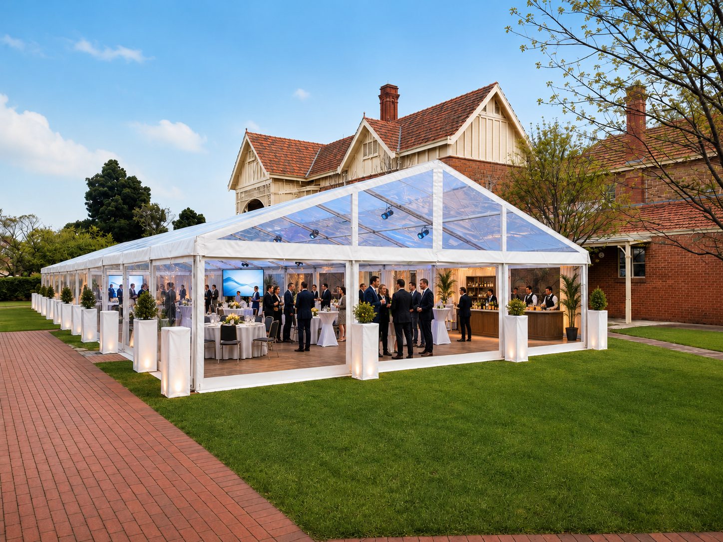 Clearspan marquee with a clear roof set up beside a heritage building for a corporate function